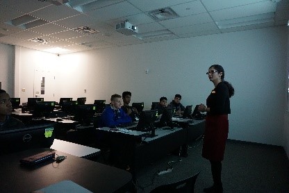 UNT faculty with students in classroom