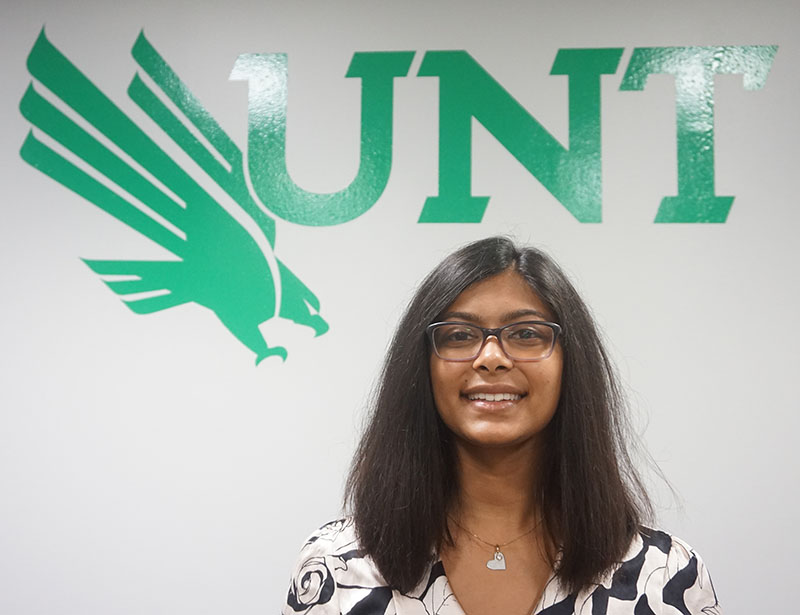 Saayli Khambekar under UNT logo