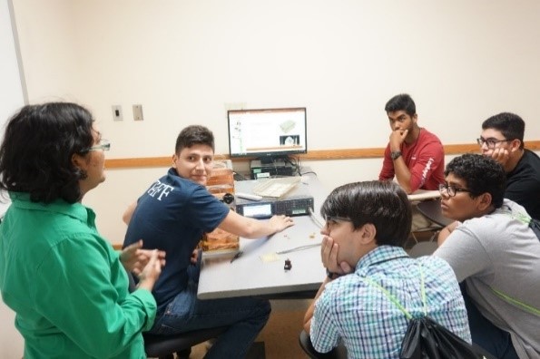UNT faculty with students