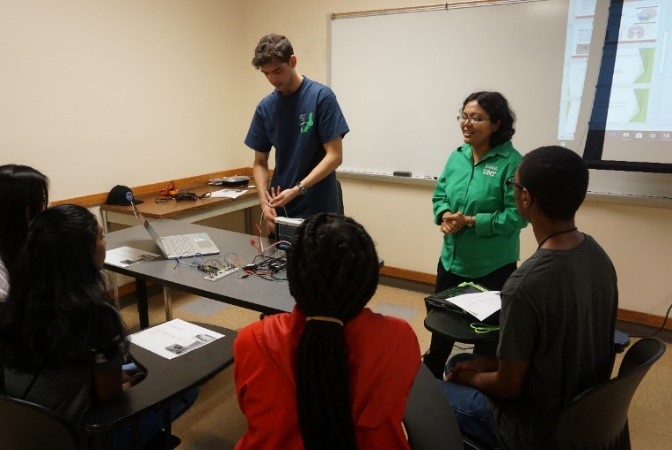 UNT faculty with students in classroom